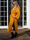 A MELODY COAT IN MARIGOLD